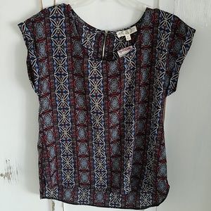 Blue and red patterned blouse